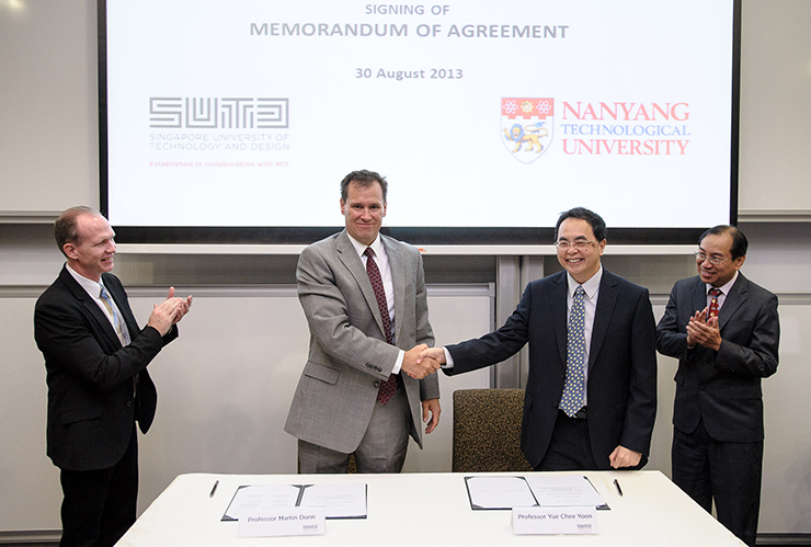 Nanyang Technological University's Associate Provost for Graduate Education Professor Yue Chee Yoon (R) and Singapore University of Technology and Design's (SUTD) Associate Provost for Research Professor Martin Dunn